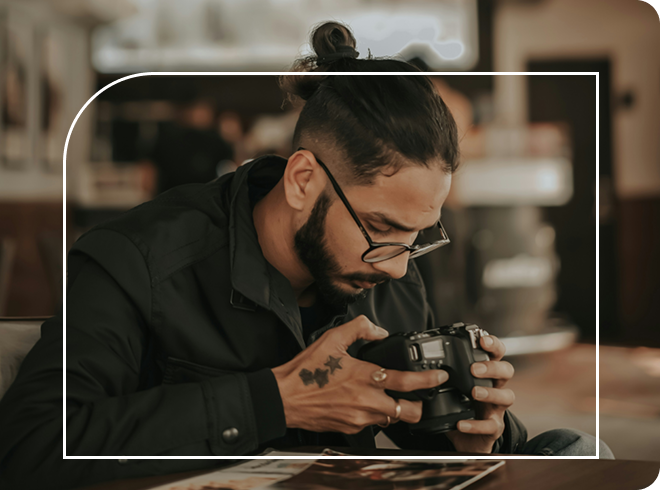 Independent Photographer looking through his photos